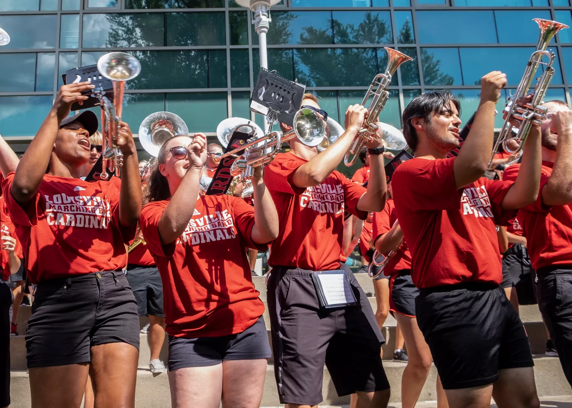Members of Cardinal Marching Band at the Alumni Picnic during Welcome Week.