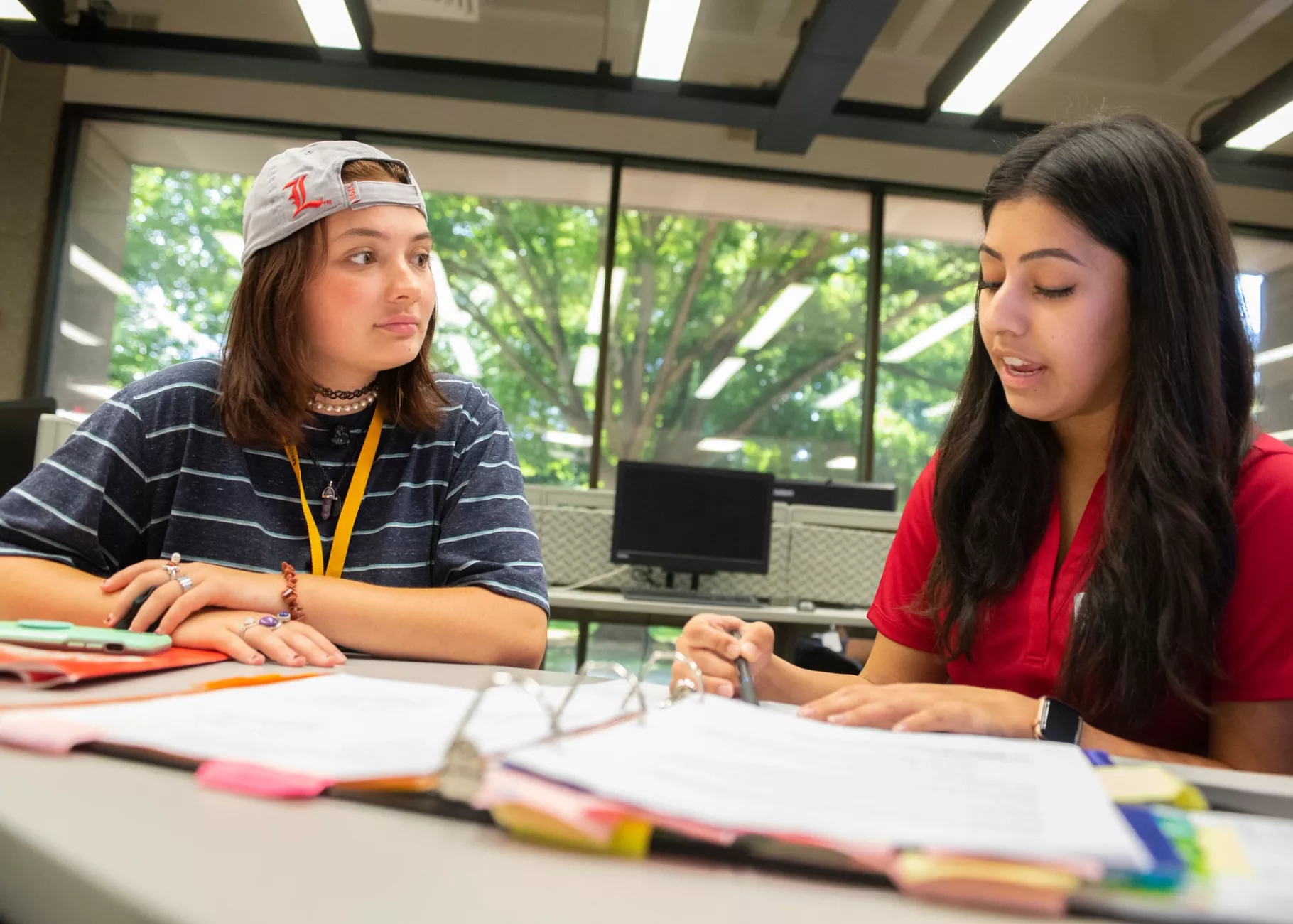 Student with an academic advisor during Orientation